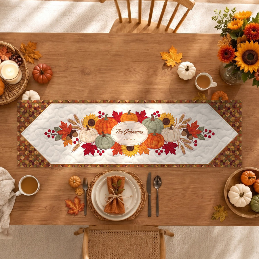 Personalized quilted table runner, Autumn Harvest design with the family name The Johnsons, on a fall dining table