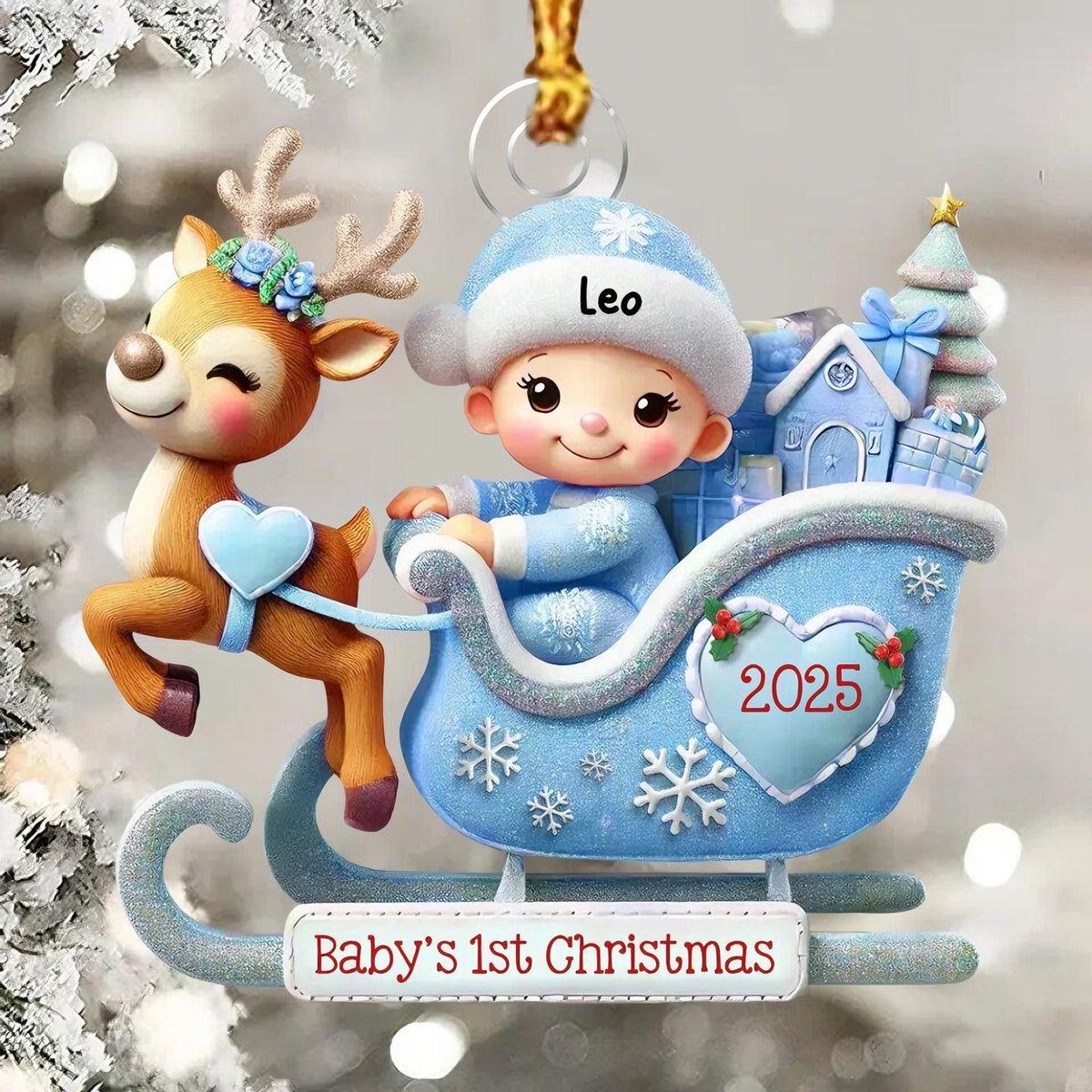 May include: A decorative ornament featuring a brown reindeer with blue flowers on its antlers pulling a light blue sleigh. A baby wearing a blue hat with the name Leo sits in the sleigh, which is decorated with a heart labeled 2025 and the text Baby's 1st Christmas.