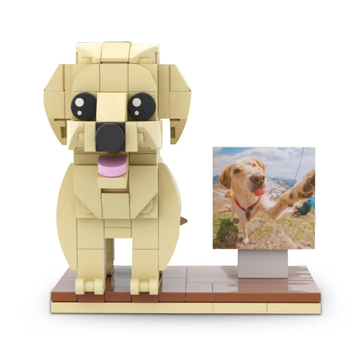 A beige brick-built dog figurine standing on a rectangular brown base. The dog has large black eyes, a dark gray nose, and a pink tongue. Next to the dog is a square photo frame displaying a picture of a golden dog outdoors.
