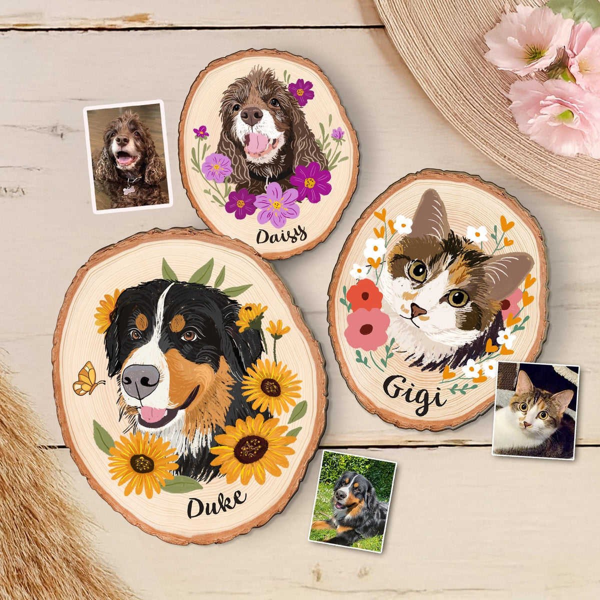 May include: Wooden pet portraits featuring a dog and cat, each with a floral design and the pet's name. The portraits are on wood slices, with additional small photos of the pets. The dog portraits have sunflowers and the cat portrait has pink and red flowers.