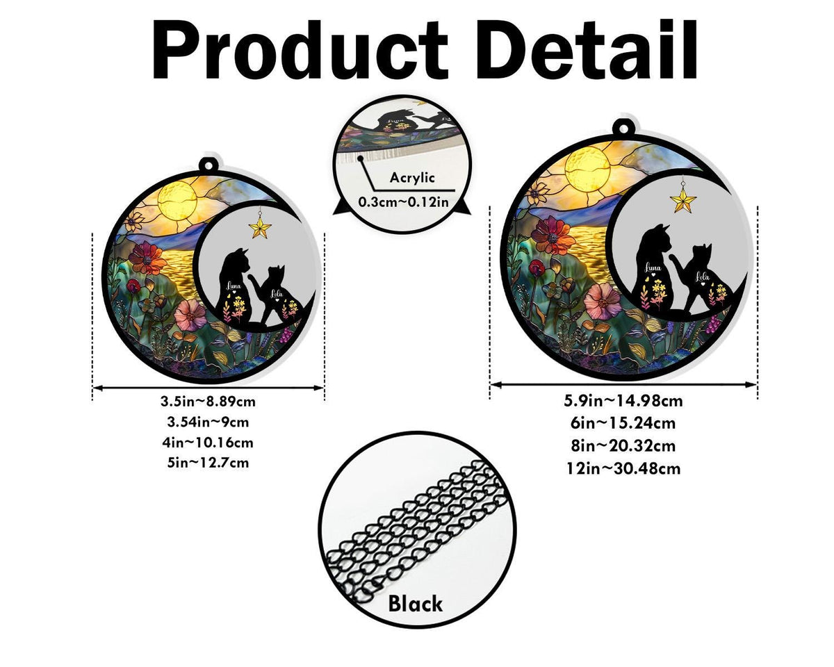 May include: Circular acrylic cat suncatcher with a black chain. The design features a silhouette of cats under a crescent moon with a star, set against a colorful sunset and floral background. The suncatcher is available in two sizes: 3.5 inches and 5.9 inches.
