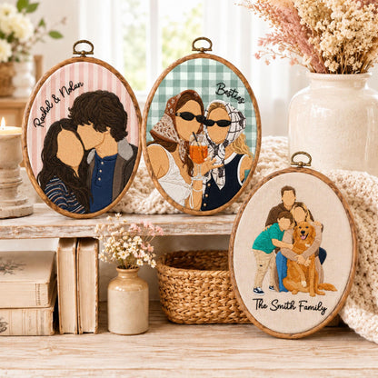 Three oval embroidery hoops featuring custom thread portraits. One shows a couple with the text Rachel & Nolan, another shows two people with the text Besties, and the third shows a family with a dog and the text The Smith Family.