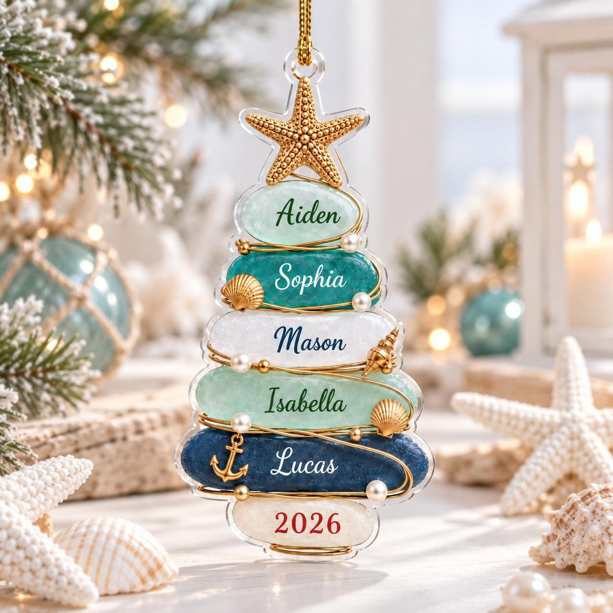 A clear, tree-shaped hanging ornament featuring six stacked, rounded segments in shades of light green, teal, white, and dark blue. Each segment is personalized with names Aiden, Sophia, Mason, Isabella, Lucas, and the year 2026.