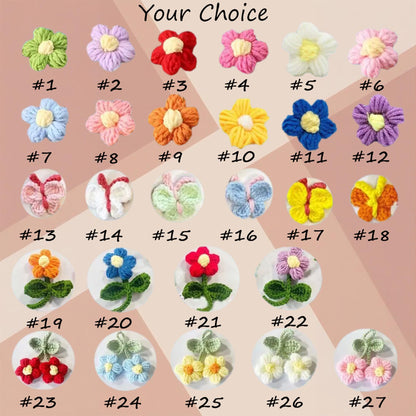 A collection of twenty-seven crocheted appliques labeled #1 through #27, featuring various flowers, butterflies, and cherries in multiple colors including red, blue, yellow, pink, green, orange, purple, and white with yellow centers.