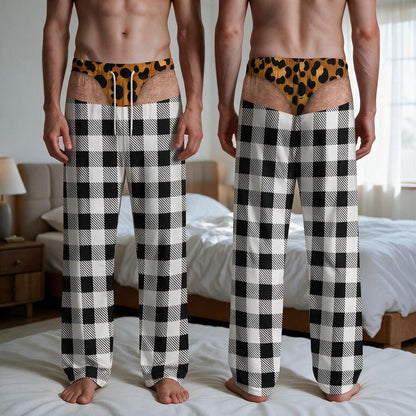 Pajama pants featuring a black and white buffalo plaid pattern with a printed graphic at the waistband that mimics the appearance of leopard print underwear visible above the top edge of the trousers.