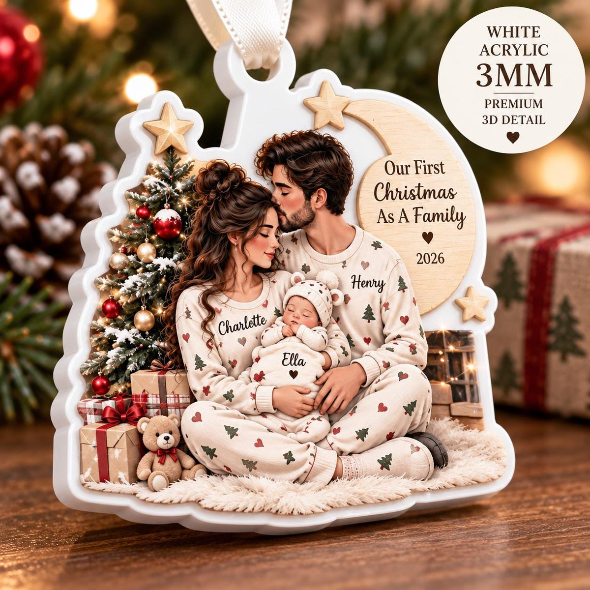 May include: A white acrylic 3mm ornament featuring a family of three in matching pajamas with a Christmas tree, gifts, and a teddy bear. The text reads Our First Christmas As A Family 2026, with names Charlette, Henry, and Ella printed on the clothing.