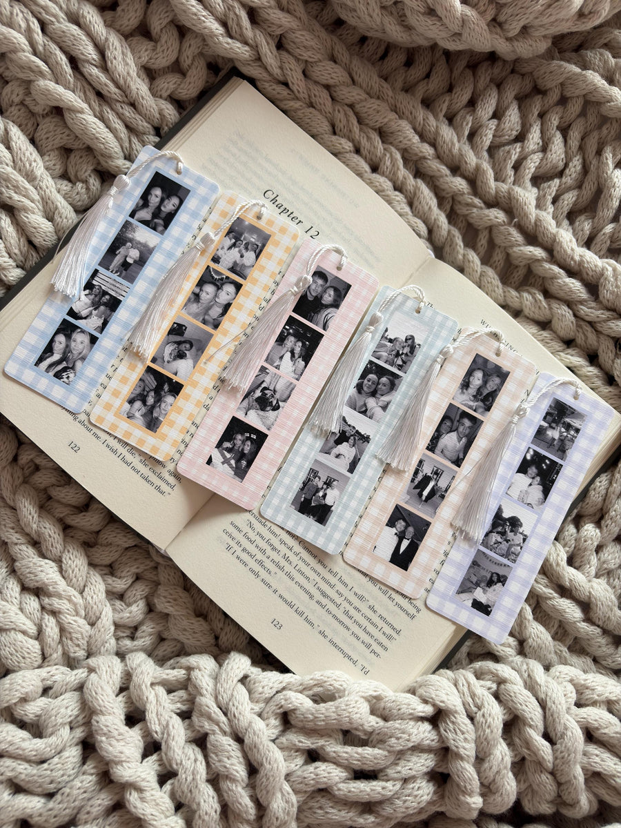 Six rectangular bookmarks with a gingham pattern in blue, yellow, pink, green, and purple. Each bookmark features a vertical strip of four black and white photographs and is finished with a white tassel attached to the top.