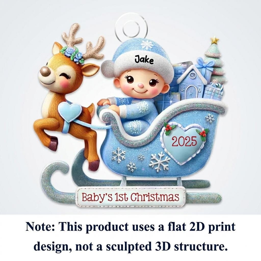 May include: A flat 2D printed ornament featuring a baby in a blue hat labeled Jake sitting in a blue sleigh with a reindeer. The sleigh displays the year 2025 on a heart and the text Baby's 1st Christmas on a banner. The design includes gifts.