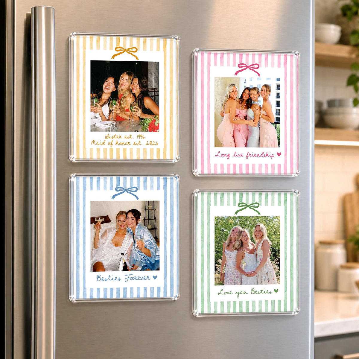 Four square acrylic refrigerator magnets featuring photo prints with pastel striped borders in yellow, pink, blue, and green. Each magnet displays a different group photo, a small bow graphic at the top, and handwritten-style text at the bottom.