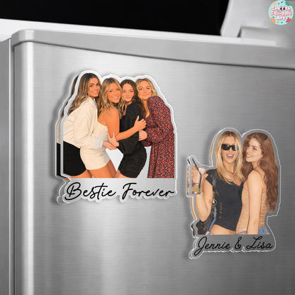 Two custom photo magnets featuring groups of friends. The left magnet shows four people posing together with the text "Bestie Forever" below. The right magnet displays two people standing side-by-side with the text "Jennie & Lisa" below.
