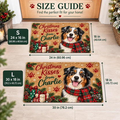 May include: Two rectangular doormats featuring a portrait of an Australian Shepherd wearing a red and green plaid scarf. The mats display the text 'Christmas Kisses from Charlie' with pine branches, gifts, and paw prints. Sizes are 24 x 16 inches and 30 x 18 inches.