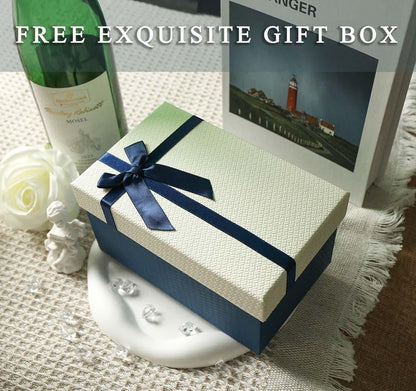A rectangular gift box with a textured cream lid and a dark blue base, featuring a dark blue satin ribbon tied in a bow on top. The text "FREE EXQUISITE GIFT BOX" is printed in white across the top portion of the image.