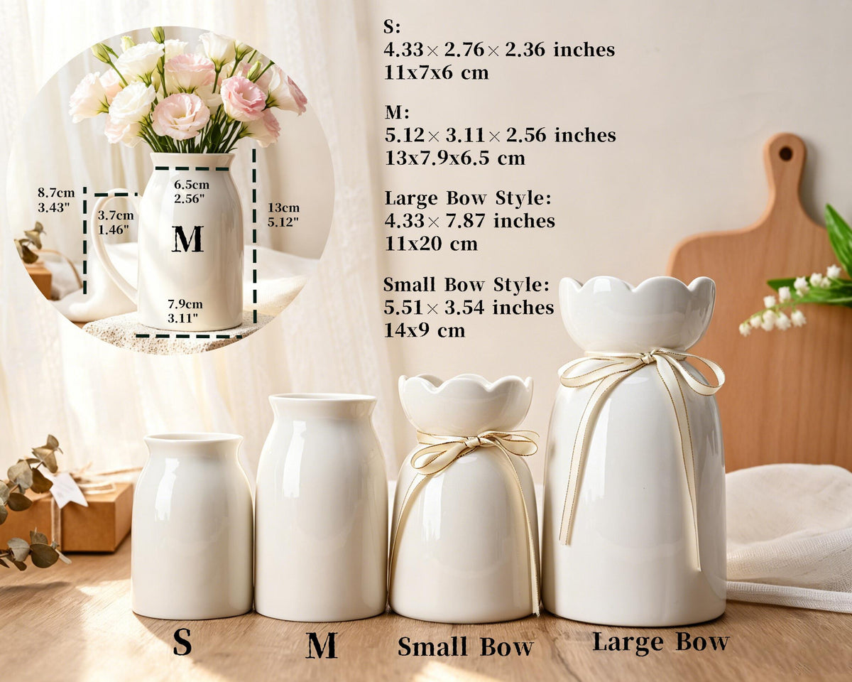 Four white ceramic vases in varying sizes and styles, including two plain cylindrical vases labeled S and M, and two vases with scalloped rims and tied ribbons labeled Small Bow and Large Bow, with dimensions listed in inches and centimeters.