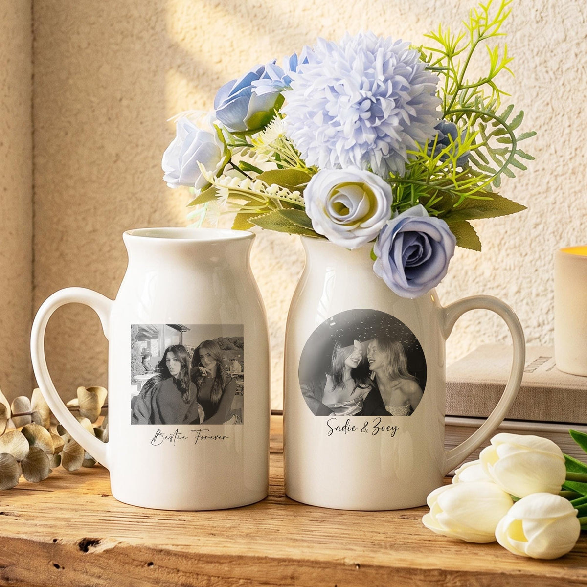 Two white ceramic pitcher-style mugs with handles, each featuring a black and white printed photograph. One mug displays a rectangular photo with the text Bestie Forever, while the other shows a circular photo with the text Sadie & Zoey.