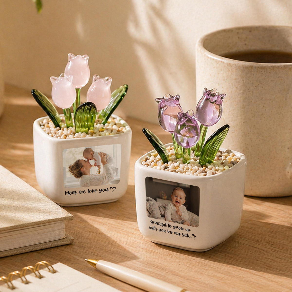 Two white ceramic flower pots with glass tulip flowers and photos. One pot has pink tulips and the text "Mom, we love you." The other has purple tulips and the text "Grateful to grow up with you by my side."