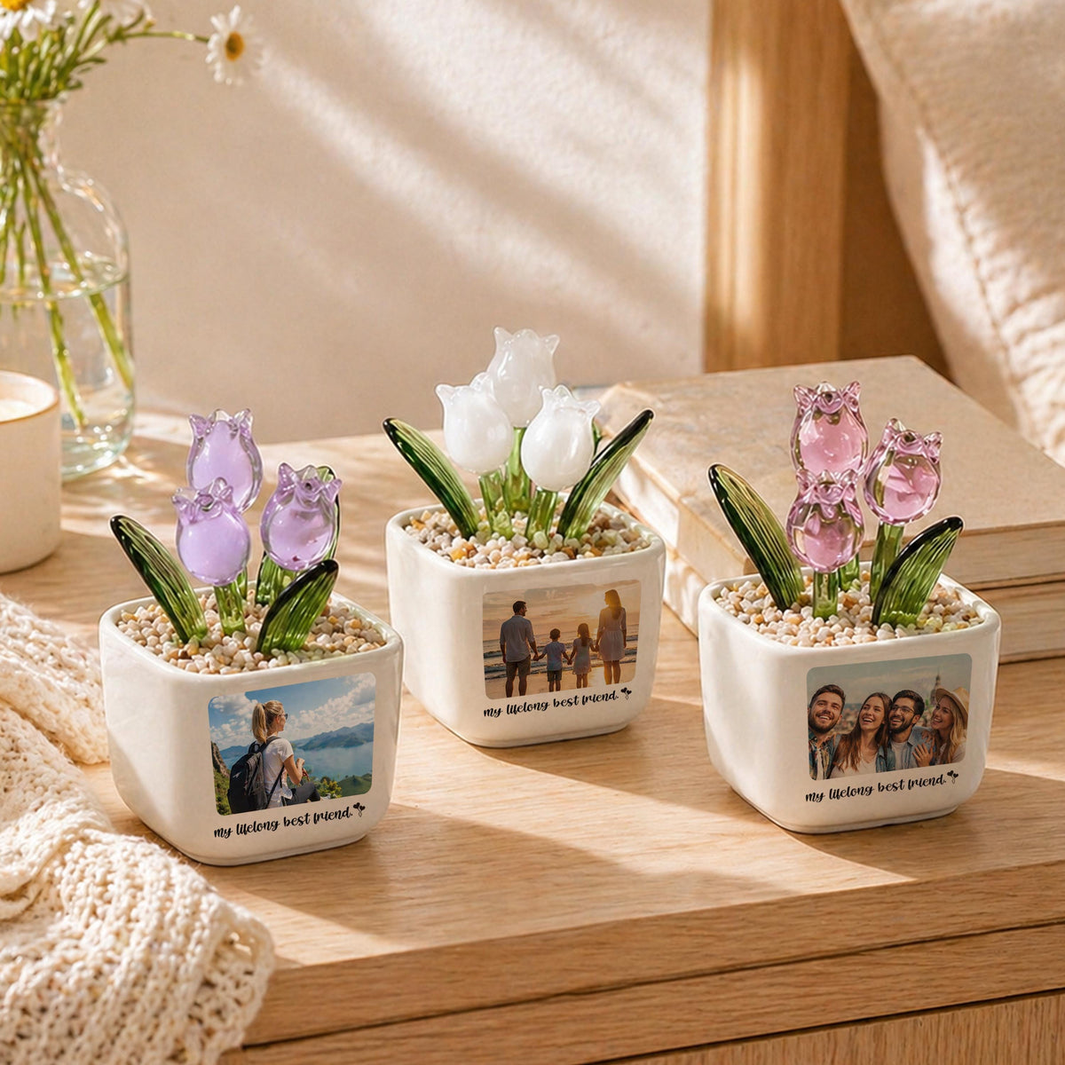 Three square white ceramic planters with glass tulip flowers in shades of purple, white, and pink. Each planter has a photo and the text "my lifelong best friend."