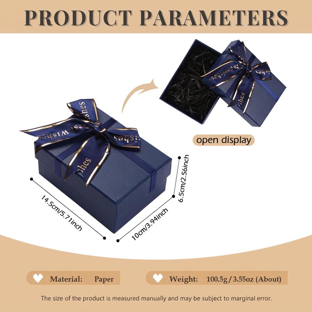 A dark blue rectangular paper gift box with a matching ribbon bow featuring the text 'best wishes' in gold. The box measures 5.71 inches by 3.94 inches by 2.56 inches. An open display view shows black paper filler inside the box.