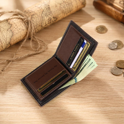 A dark brown leather bifold wallet with visible stitching. The interior features multiple card slots and a bill compartment containing paper currency. The left side is engraved with the text, My Person, My Forever Man.