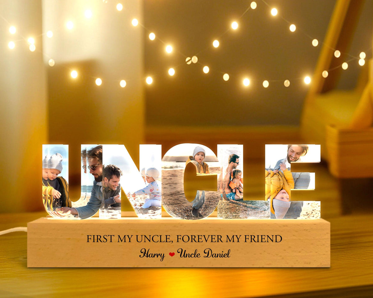 May include: A wooden photo frame with the word "UNCLE" spelled out in large letters. Each letter is filled with a different photo of a family member. The base of the frame has the text "FIRST MY UNCLE, FOREVER MY FRIEND" and "Harry Uncle Daniel".