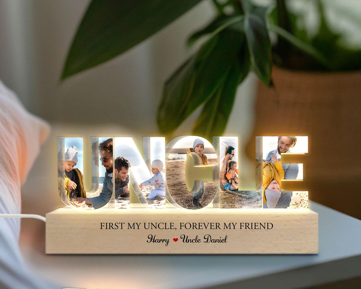 May include: A wooden light-up sign that spells "UNCLE" with photos of a family inside each letter. The sign has a wooden base with the text "FIRST MY UNCLE, FOREVER MY FRIEND" and "Harry Uncle Daniel".