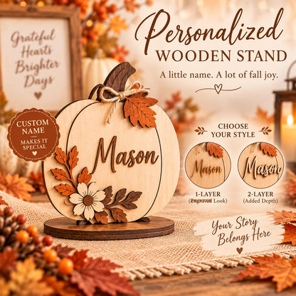 May include: A personalized wooden stand shaped like a pumpkin, featuring the name Mason in script, decorated with wooden leaves and a flower. The text reads Personalized WOODEN STAND, A little name. A lot of fall joy., CUSTOM NAME MAKES IT SPECIAL, CHOOSE YOUR STYLE, 1-LAYER, 2-LAYER, and Your Story Belongs Here.