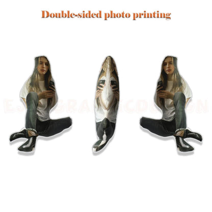 Three double-sided photo pillows with a person holding a phone on each side. The pillows are white with a black outline and the person is wearing a white shirt and blue jeans.